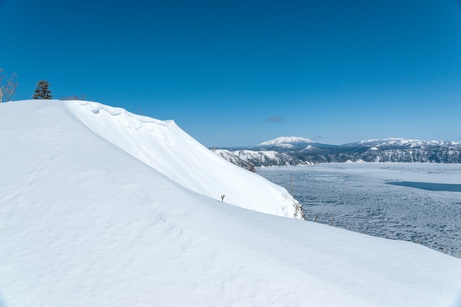 Lake Mashu covered with snow