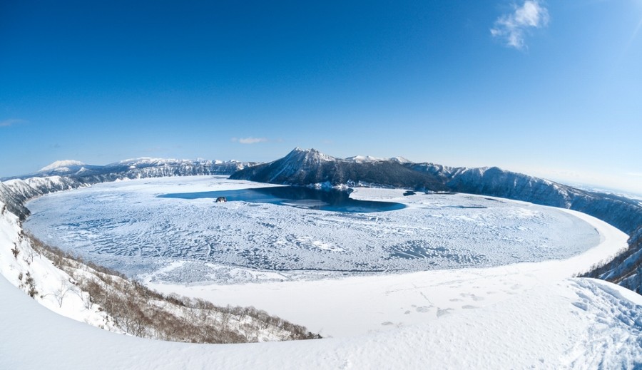 view of Lake Mashu in winter